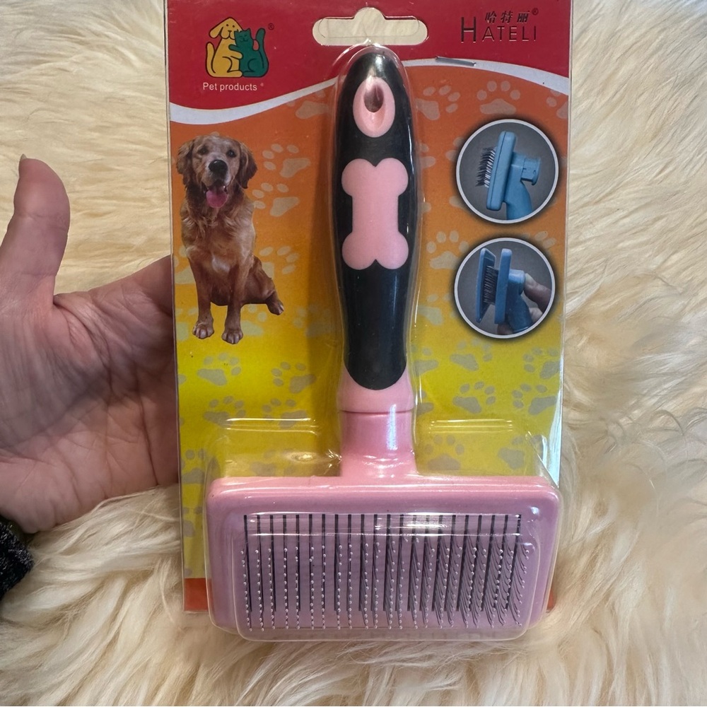 Self cleaning dog brush